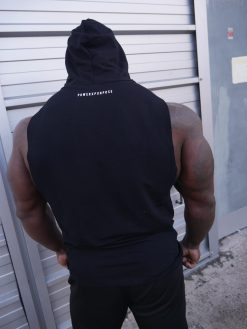 Muscular bodybuilder wearing power x purpose don't talk just lift sleeveless hoodie.