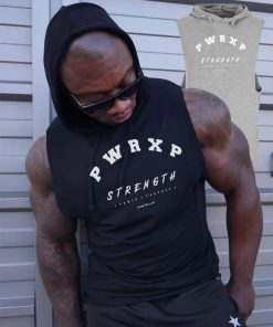 muscular man wearing power x purpose quick dry tank top for the gym.