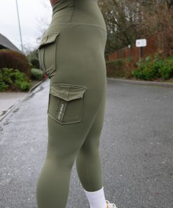 curvy girl wearing power x purpose cargo workout leggings in green which come in plus size xxl