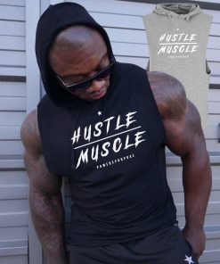 muscular man wearing power x purpose quick dry tank top for the gym.