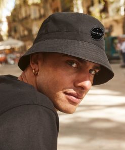 urban trendy guy wearing power x purpose bucket hat