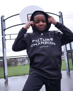 sporty child wearing kids power x purpose hoodie
