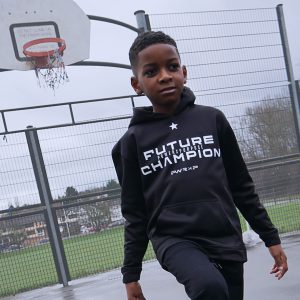 sporty child wearing kids power x purpose hoodie